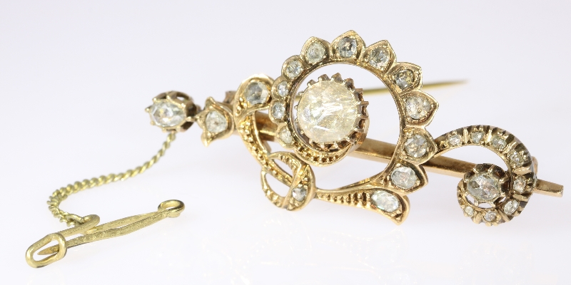 Antique gold brooch stylized Sol Key with big rose cut diamond